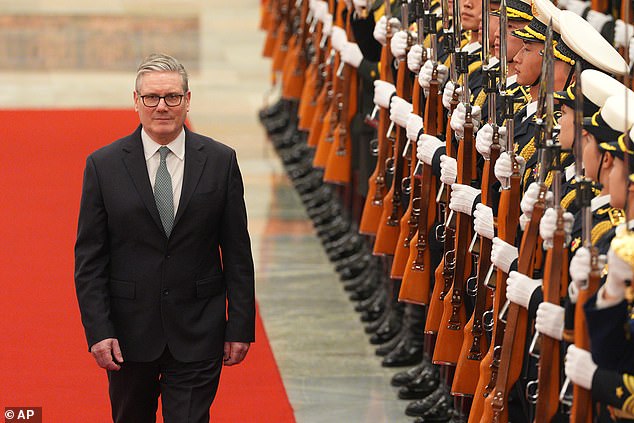 British Prime Minister Keir Starmer attends a ceremonial welcome ahead of his meeting with Chinese Premier Li Qiang at the Great Hall of the People in Beijing, Thursday