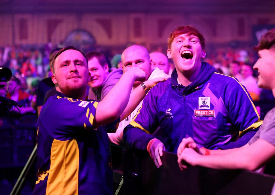 Luke Littler with streamer 'Angry Ginge' Morgan Burtwistle at the 2025 PDC World Darts Championship.