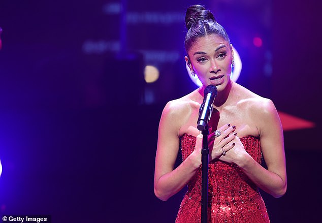 Scherzinger looked in her element as she serenaded the celebrity crowd at the fundraiser