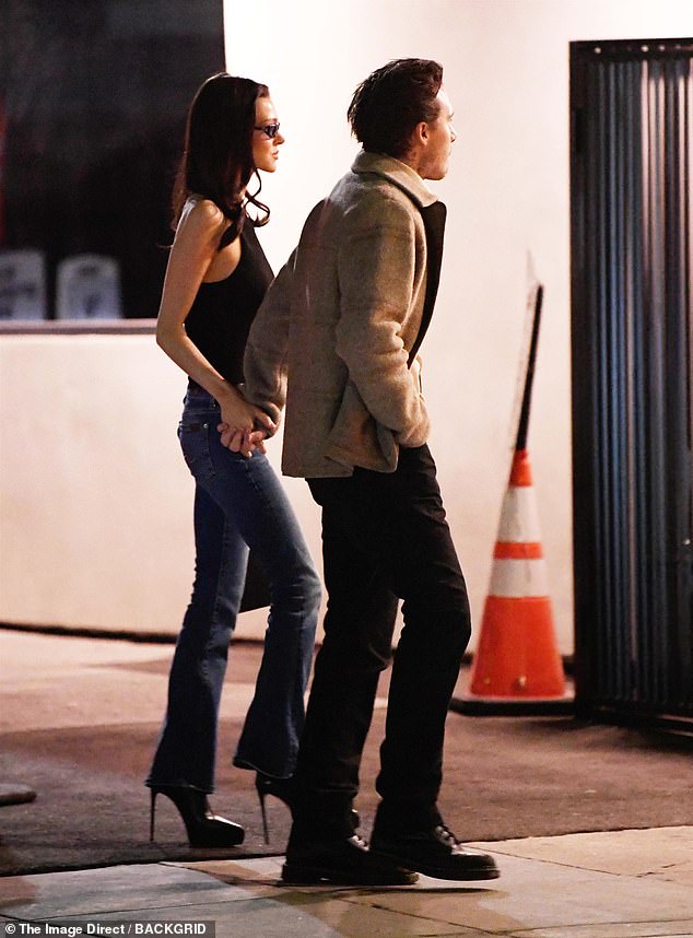 Nicola, in her towering heeled boots, held on tightly to Brooklyn as they headed to the restaurant