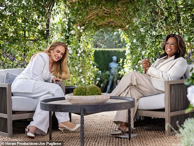 She added, 'I remember Adele told me she was deadlifting and I pretended to know what she was talking about'; the pair seen above in 2021