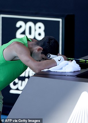 Alcaraz was doubled over on the edge of his on-court coaching box