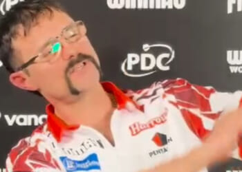 Darts star plays fake violin and says 'it's the year of the horse so giddy-up mother truckers' in bizarre interview