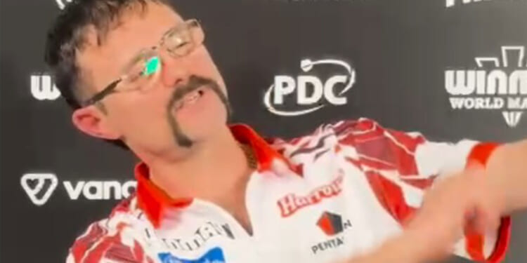 Darts star plays fake violin and says 'it's the year of the horse so giddy-up mother truckers' in bizarre interview