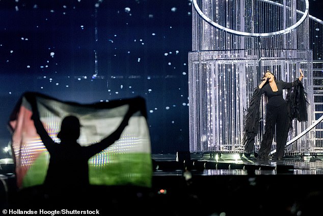 The publication went on to say it is understood the comments made were not related to the conflict in the Middle East - after several countries pledged to boycott the event due to Israel's participation (Protesters flying a Palestine flag as Israel performed last year)