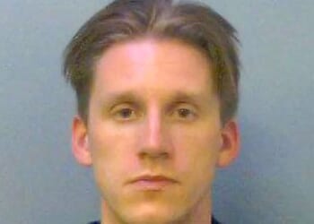 Ex-Eton College teacher who wrestled with pupils in their bedrooms is jailed over sexual assault of 'vulnerable' boy