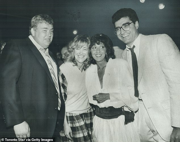 O'Hara remembered the 'weirdest mix of phone calls' after Candy's passing, with people wanting to celebrate her but also mourn Candy; They are seen with Andrea Martin and Eugene Levy in a throwback snap