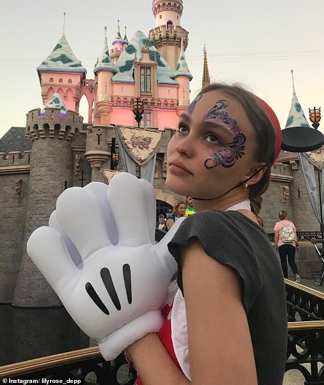 Despite then being 18, Lily Rose Depp sported a glittered face while enjoying a trip to Disneyland