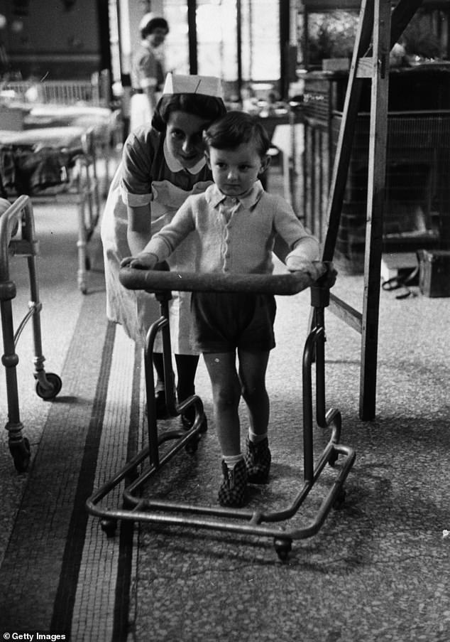 A young patient is pictured recovering at the Jenny Lind Hospital in Norwich in 1955