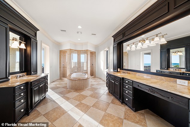 The primary suite is comprised of 1,000 square feet itself and has a water-front terrace