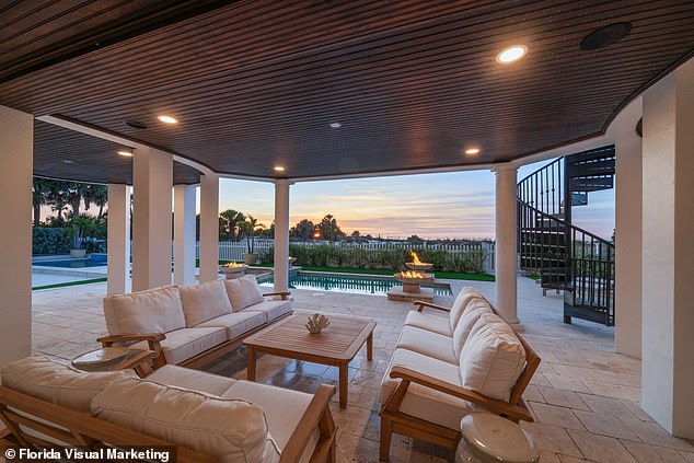 In addition, there is 1,500 square feet of outdoor space that includes a heated pool and spa