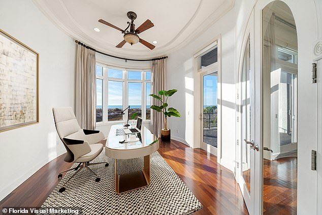 There is teak, marble and natural stone flooring throughout, as well as a designer kitchen