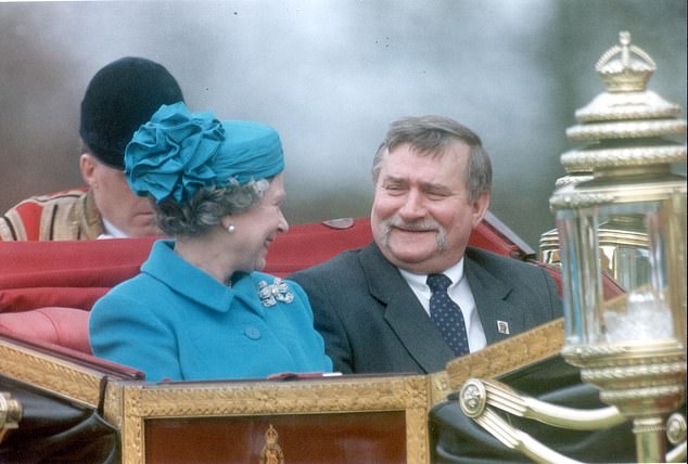 Walesa with Queen Elizabeth II in 1991. When the late Queen invited him and his wife Danuta, a former flower shop assistant, to stay with her for three days at Windsor Castle, social commentators feared the couple would be horribly out of their depth