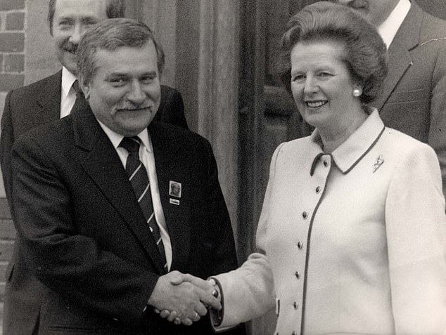 Walesa shakes hands with Margaret Thatcher in 1989. While Walesa forged a close bond with the Queen, Mrs Thatcher's admiration for him, frequently expressed during her time as prime minister, was not requited