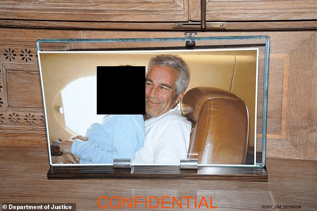 A framed picture of Epstein with a young girl. The original image was in a previous file drop