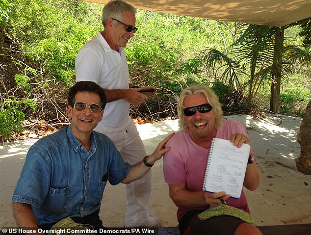 Photographs of the men posing and smiling together were released in an earlier tranche of Epstein files