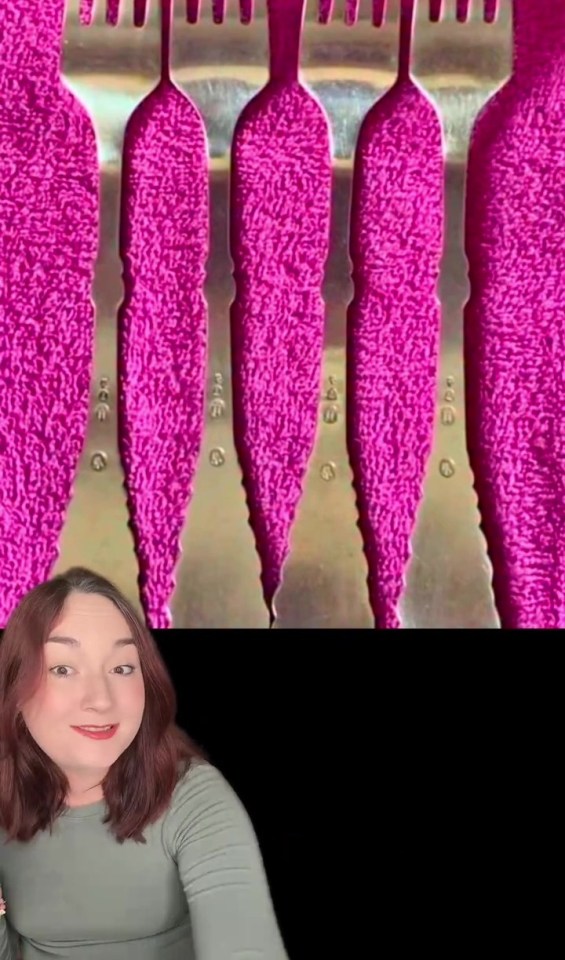 Optical illusion of shiny forks appearing between pink slime.