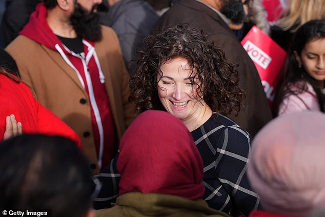 Ms Stogia meets with Labour supporters at the announcement in the Gorton and Denton constituency