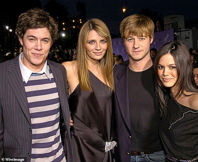 Mischa with the cast of The OC in 2003. She found global fame playing Marissa Cooper in the beloved teen drama