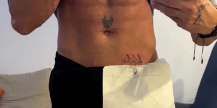 Katie Price's new husband gets ANOTHER tattoo of her name after being exposed as a liar and failing to fly to UK