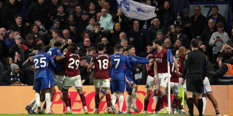 Todibo SENT OFF for 'strangling' Joao Pedro during wild mass brawl moments after Chelsea take last-gasp lead vs West Ham