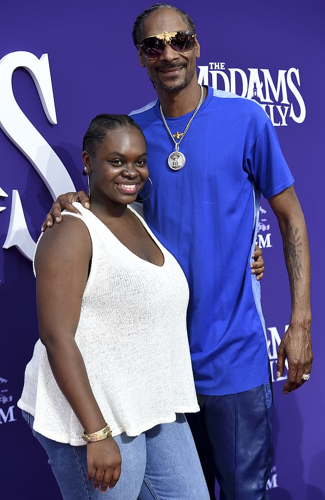 Cori, 26, is the youngest of the three daughters Snoop Dogg, real name Calvin Broadus, shares with his wife of 28 years Shante Broadus; Cori pictured with her father in 2019