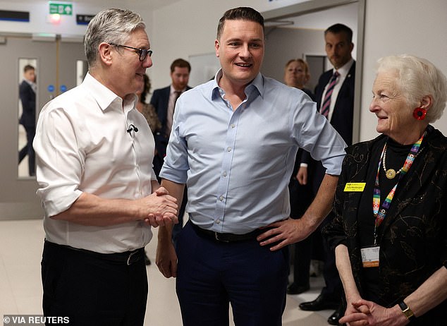 Sir Keir with Health Secretary Wes Streeting. Mr Streeting is another one of the PM's leadership rivals