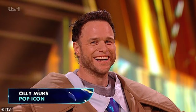 But Joel confirmed that despite only appearing occasionally, Moel too would be receive an elaborate unmasking during Saturday's episode - where he was revealed to be Olly