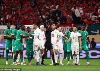 AFCON final descends into CHAOS as Senegal boss calls his team off the pitch after controversial late penalty is awarded to Morocco by VAR