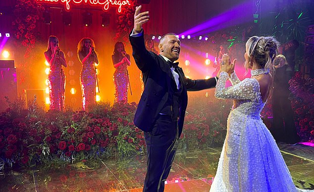 Newlyweds Conor McGregor and Dee Devlin share their first dance at a lavish reception, after tying the knot at the Vatican's Chapel of Santo Stefano degli Abissini in December