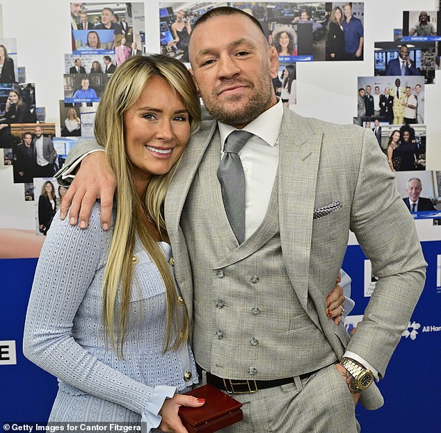 Dee Devlin and Conor McGregor at the Cantor Fitzgerald Relief Fund's Charity Day 2025 in New York. They have stayed together despite the UFC fighter's string of cheating scandals