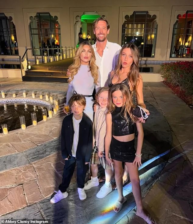 The model, 40, jetted off to Dubai to celebrate New Year with her husband Peter Crouch and their four children (Pictured)