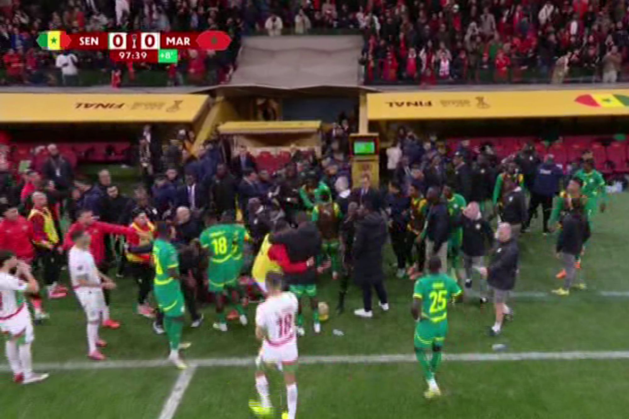 An image collage containing 1 images, Image 1 shows A football match with Senegal vs. Morocco is tied 0-0