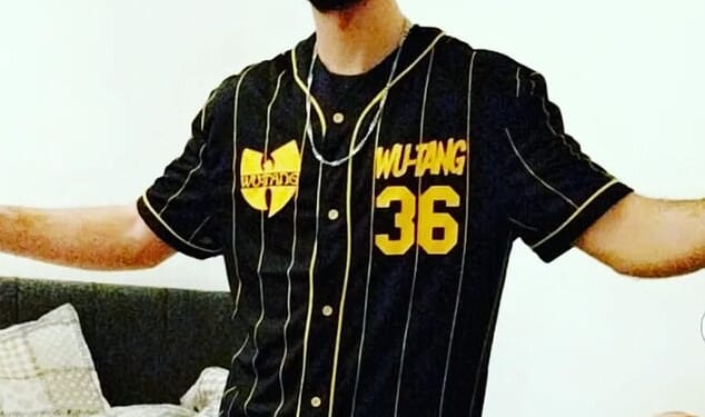 Algerian asylum seeker Adel Kerari, 27, has been jailed for two years and eight months for his role in a 'cowardly' phone-snatching gang