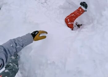 This incredible video captures the tense moment one man rescues a fellow skier who had been buried in deep snow following an avalanche in Switzerland