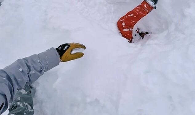 This incredible video captures the tense moment one man rescues a fellow skier who had been buried in deep snow following an avalanche in Switzerland