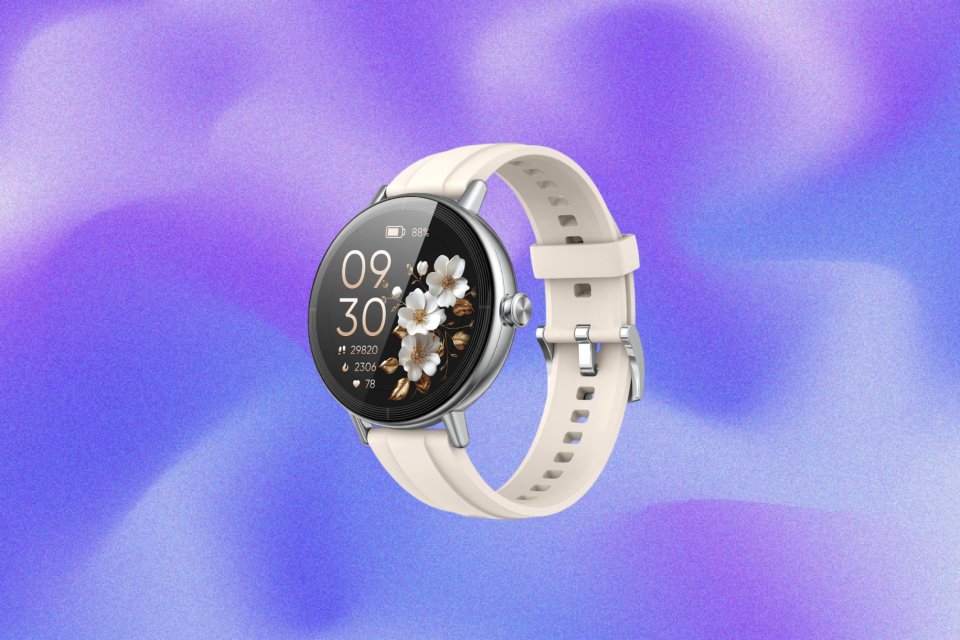 A smartwatch with a cream-colored strap and a digital display showing the time as 9:30, 88% battery, and an illustration of white flowers with golden stems and leaves.