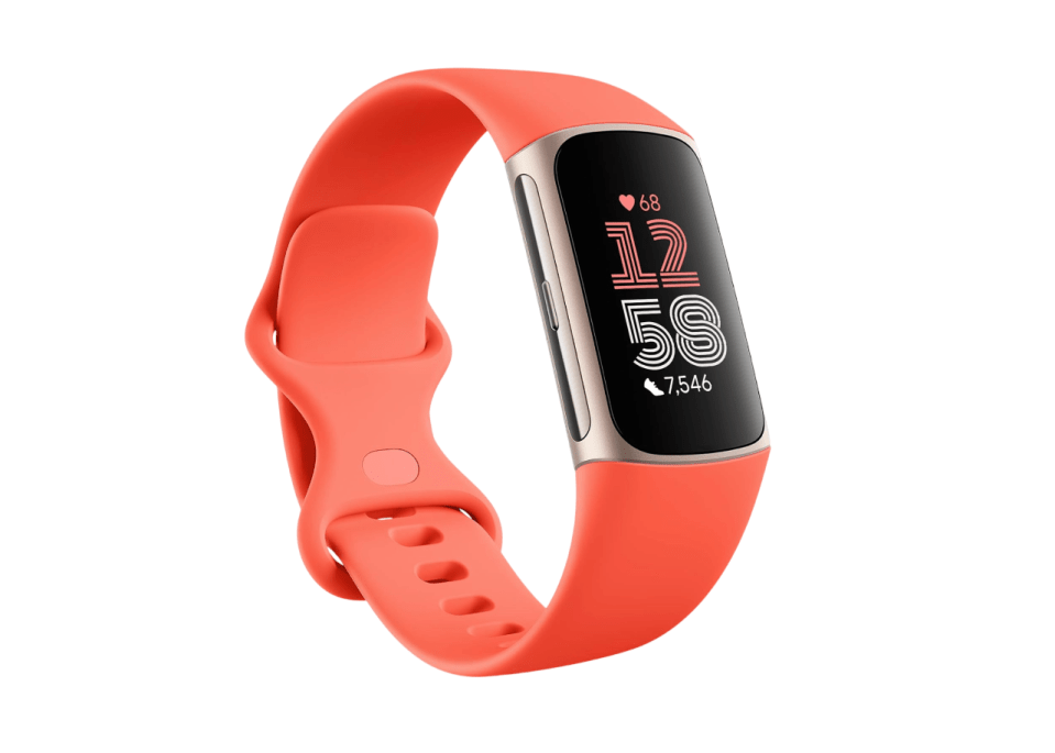 A salmon-colored fitness tracker with a black screen displaying 12:58, 68 heartbeats per minute, and 7,546 steps.