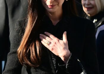 Anne Hathaway cut a sombre figures as they led the mourners paying tribute to Valentino Garavani at his funeral in Rome on Friday