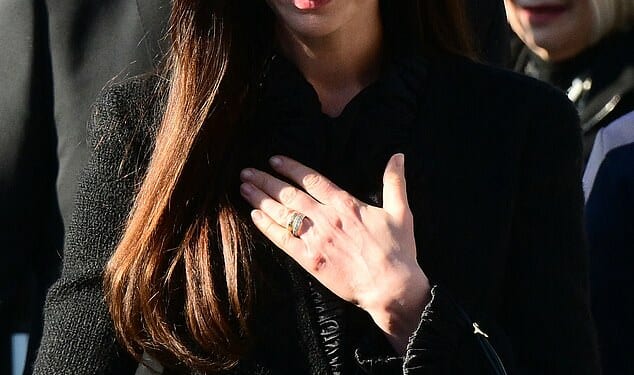 Anne Hathaway cut a sombre figures as they led the mourners paying tribute to Valentino Garavani at his funeral in Rome on Friday