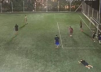 The distressing clip showed nine men playing a game of football when five hitmen dressed as cops emerged onto the pitch at around 9:30pm on January 7