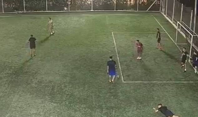 The distressing clip showed nine men playing a game of football when five hitmen dressed as cops emerged onto the pitch at around 9:30pm on January 7