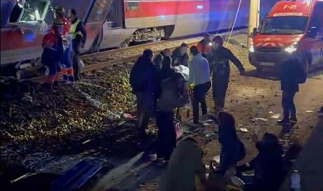 At least five dead and more trapped after two high-speed trains derail in Spain
