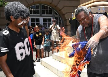 Australia Day 2026 LIVE updates: Invasion Day protester BURNS Australian flag and neo-Nazis are busted hiding in the crowd at anti-immigration rally - as cops are forced to swoop on confrontation between rival demonstrators