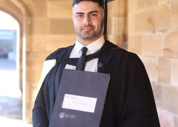 A robot scientist accused of plotting an Australia Day riot complete with Molotov cocktails has been arrested by counter-terrorism cops (PhD student Sepehr Saryazdi is pictured)