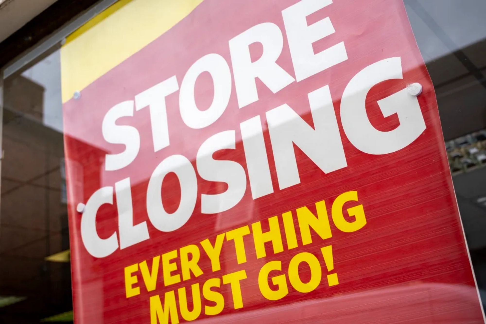 An image collage containing 1 images, Image 1 shows A red sign in a storefront window reads "STORE CLOSING EVERYTHING MUST GO!"