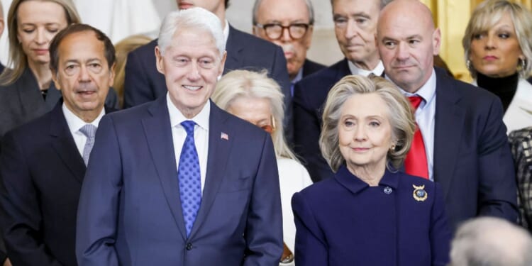 Former President Bill Clinton and former Secretary of State Hillary Clinton attend the inauguration ceremony where President Donald Trump was sworn in as the 47th President in the U.S. Capitol Rotunda in Washington, D.C., on Jan. 20, 2025.