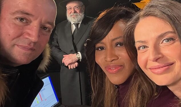 Ahmed Al Ahmed is pictured (l-r) with Rabbi Yehoram Ulman, father-in-law of the Bondi victim Rabbi Eli Schlanger, and CNN anchors Zain Asher and Bianna Golodryga