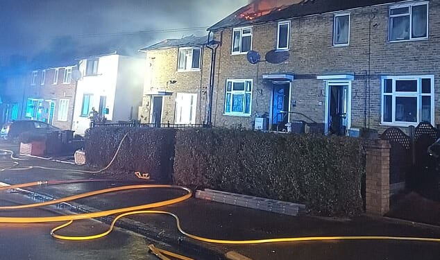 A child and two adults have been rushed to hospital after a fire engulfed a two-storey home in Morden, south-west London