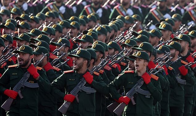 The Iranian Revolutionary Guard Corps (IRGC) has led a deadly crackdown on anti-government protesters. Pictured are soldiers at a rally in 2024